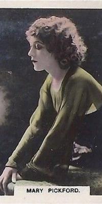 A tinted black and white profile photograph of Mary Pickford.